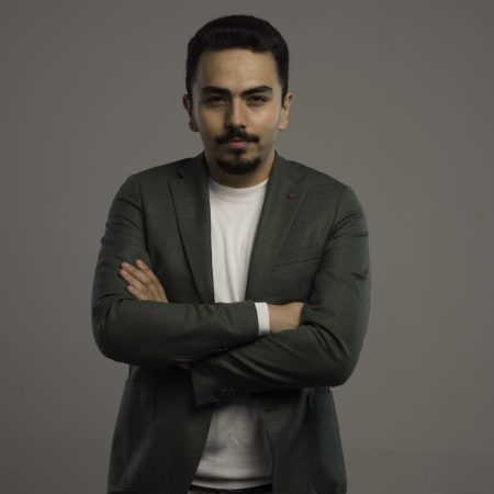 A businessman in dress code posing as a professional. High quality photo